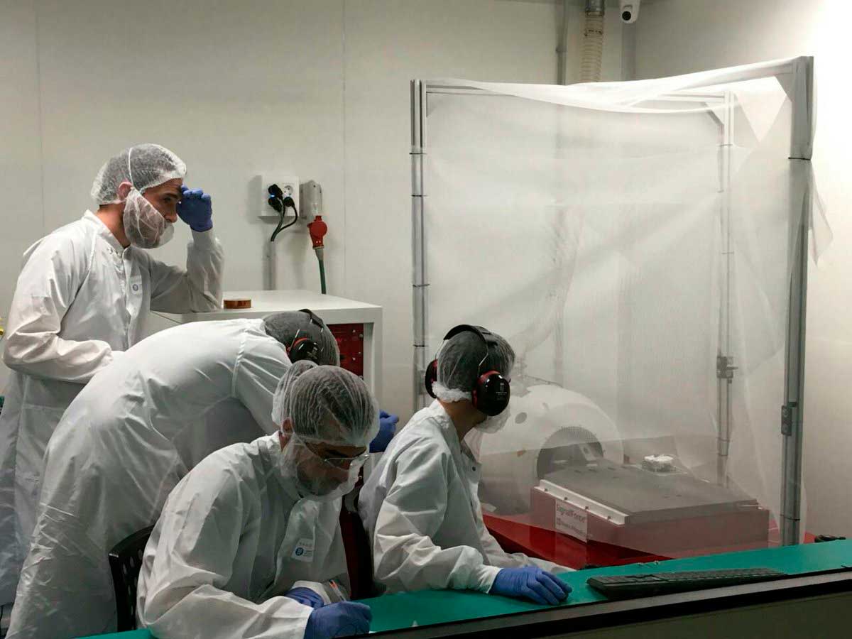 <small><strong>Figure 4:</strong> A group of students performing random vibration tests at UPC NanoSat Lab facilities. Credit: <i>UPC NanoSat Lab</i></small>